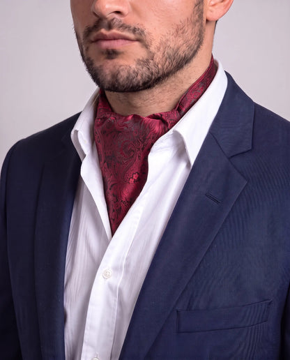 Mann i mørk dressjakke og hvit skjorte med rød floral ascot, modell Shanghai